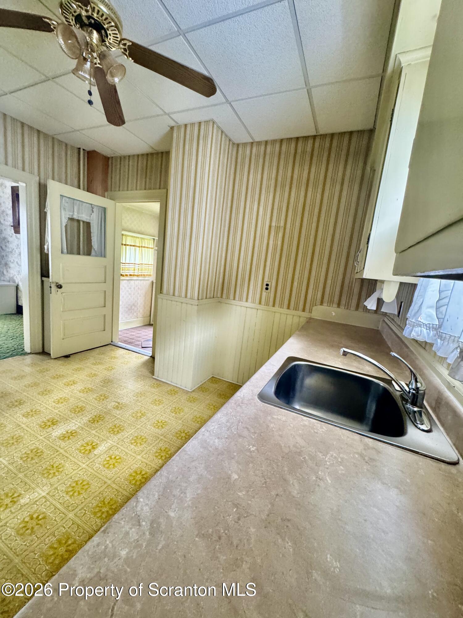 2120 Myrtle Street Scranton, PA 18510 - Photo 24 of 42 a kitchen with a sink and cabinets