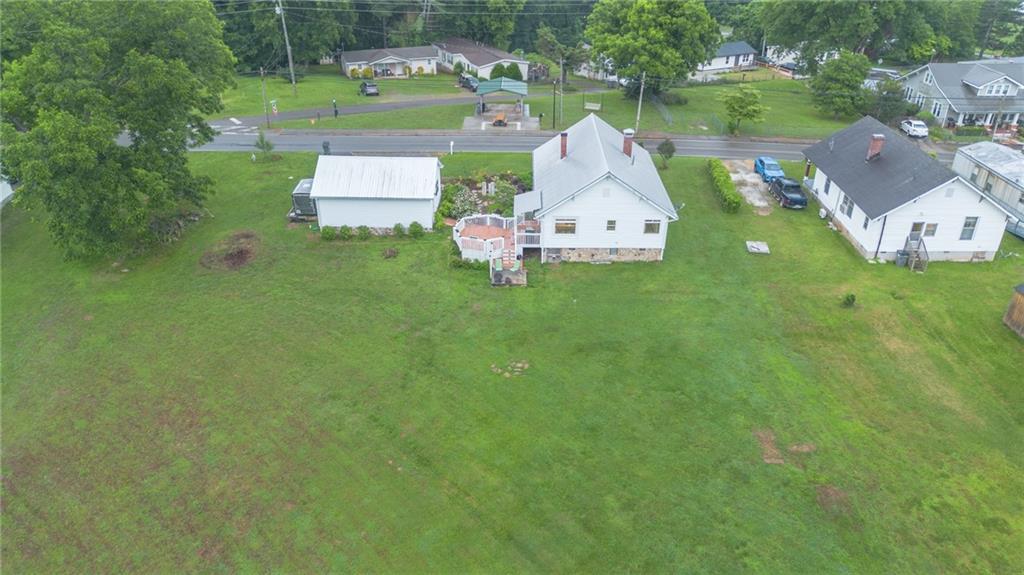 1815 Pickens Street Ball Ground, GA 30107 - Photo 34 of 38 an aerial view of a house with a garden