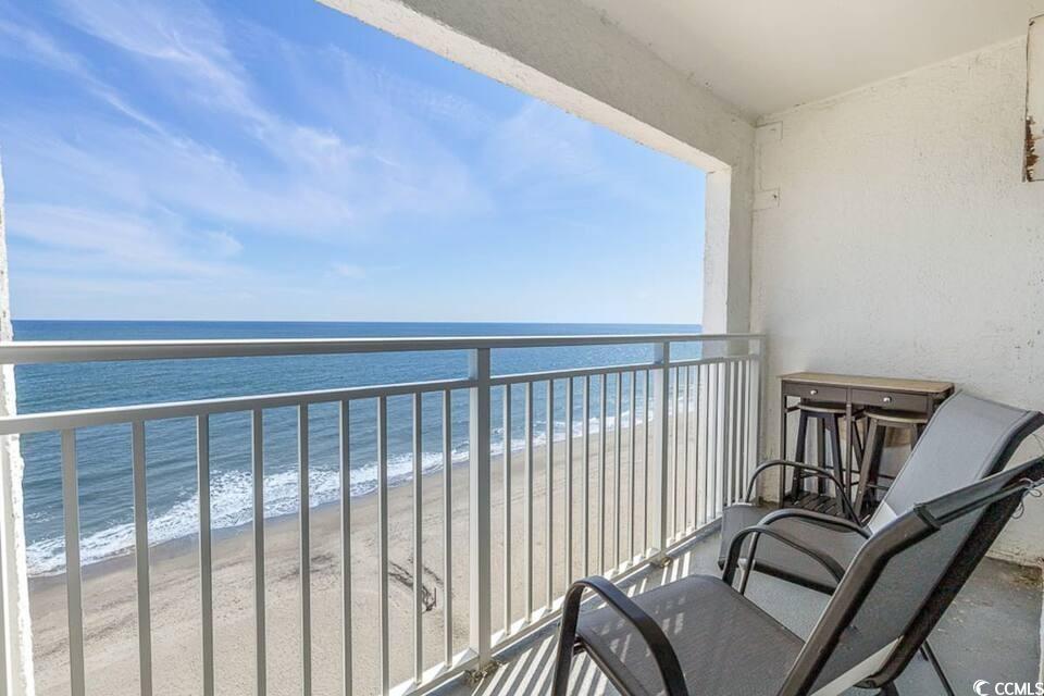 1207 South Ocean Boulevard, Unit 21001 Myrtle Beach, SC 29577 - Photo 2 of 23 Balcony featuring view of water and beach