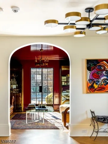 a view of a lobby with furniture and floor to ceiling window
