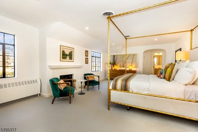 a bedroom with bed and window