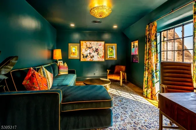 a living room with furniture and window