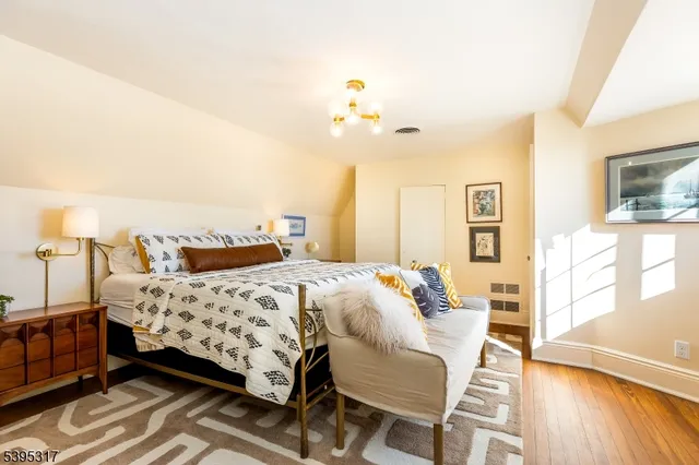 a bathroom with a shower sink and mirror