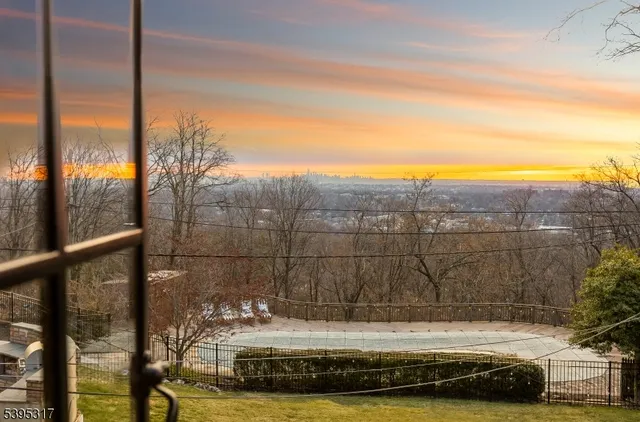 a view of a yard and mountain view