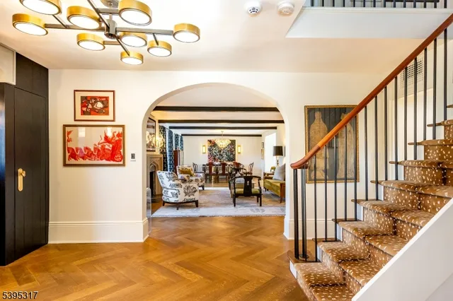 a view of a livingroom with furniture and white walls