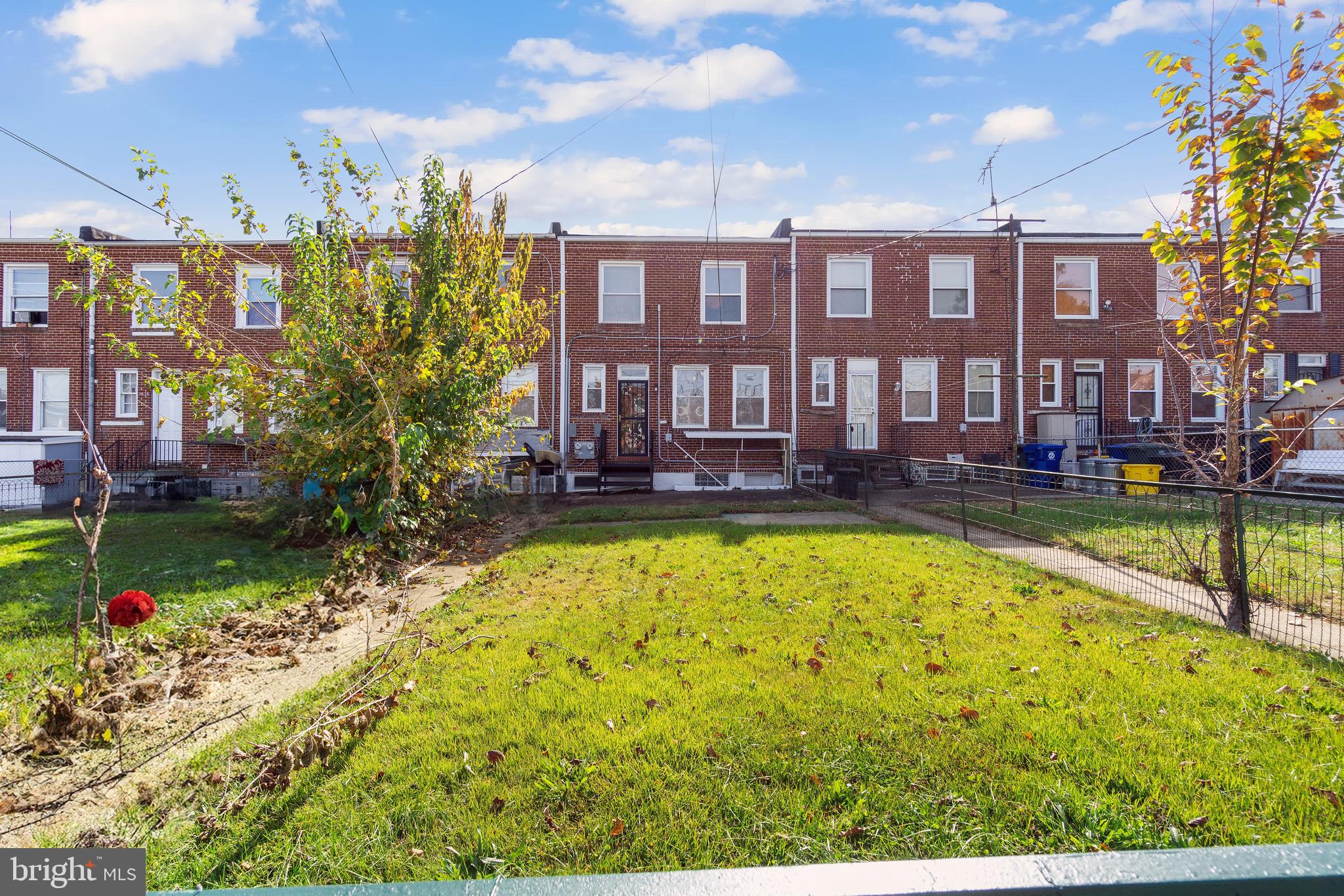 3572 Juneway, Unit 1 Baltimore, MD 21213 - Photo 21 of 23 a swimming pool view with a seating space and a garden view