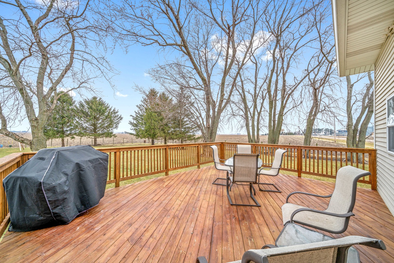 11036 Chicago Road Waterman, IL 60556 - Photo 22 of 43 a view of a chairs and table on the deck