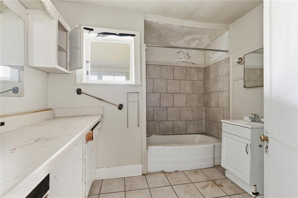 1805 Blue Ridge Drive Blue Ridge, GA 30513 - Photo 16 of 31 a bathroom with a sink a toilet and shower