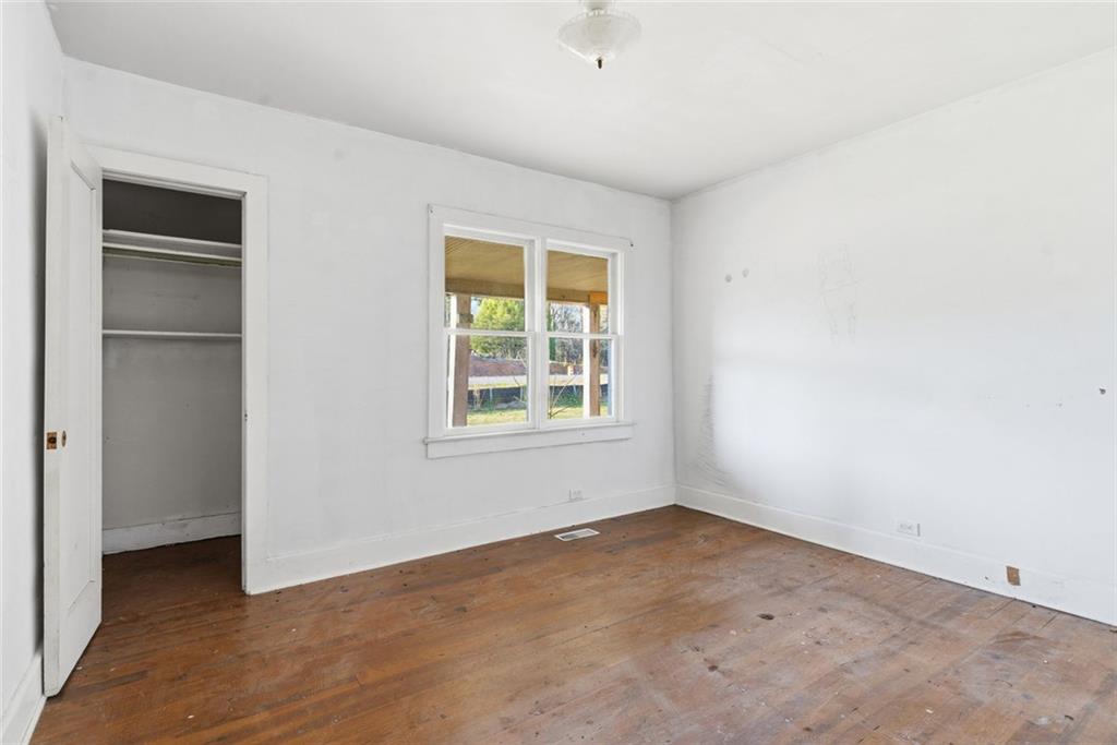 1805 Blue Ridge Drive Blue Ridge, GA 30513 - Photo 18 of 31 an empty room with a window