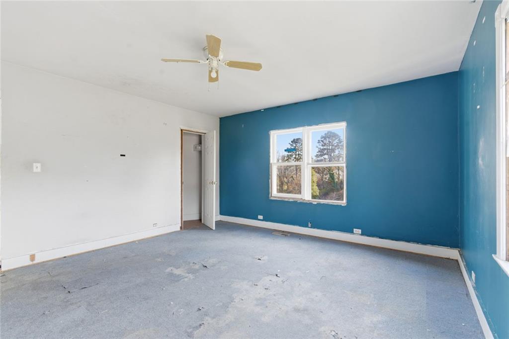 1805 Blue Ridge Drive Blue Ridge, GA 30513 - Photo 21 of 31 a view of an empty room with a window