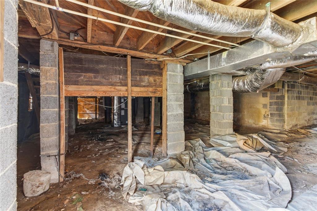 1805 Blue Ridge Drive Blue Ridge, GA 30513 - Photo 24 of 31 a view of a porch with a table and chairs