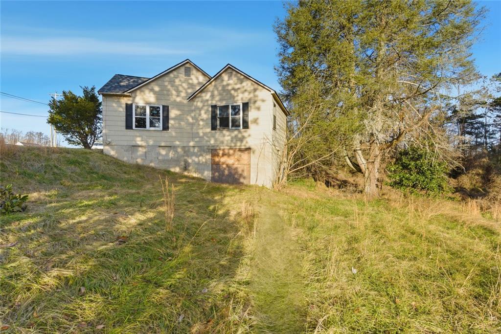 1805 Blue Ridge Drive Blue Ridge, GA 30513 - Photo 25 of 31 a view of a large body of water with water fall