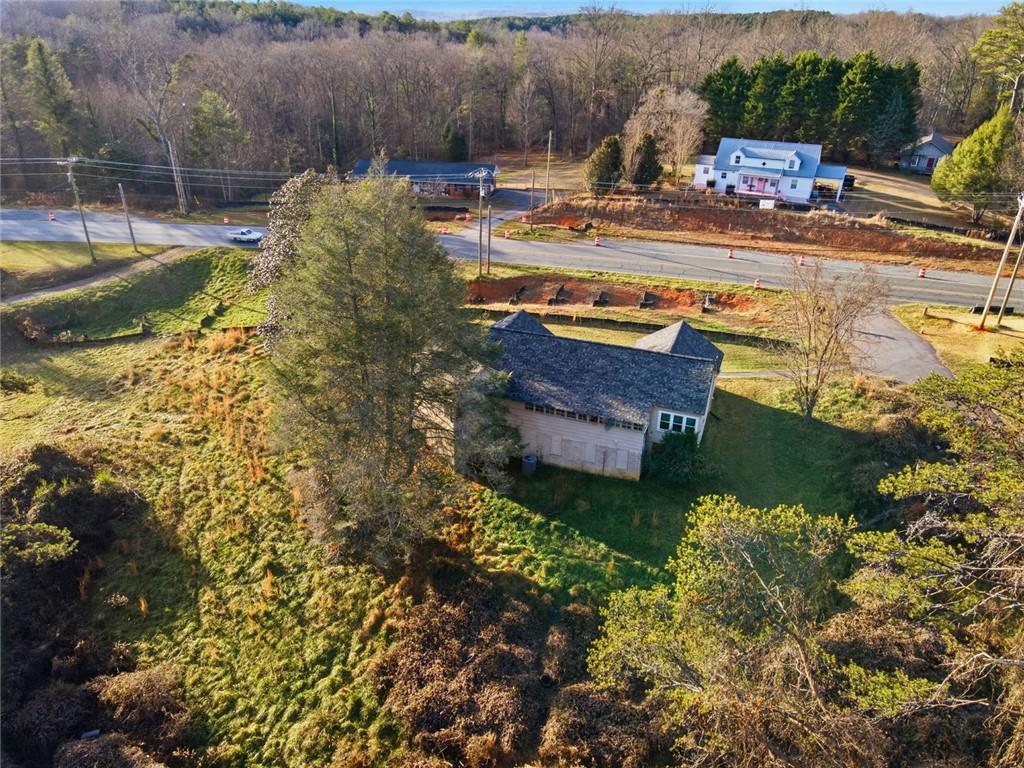 1805 Blue Ridge Drive Blue Ridge, GA 30513 - Photo 26 of 31 a view of a swimming pool with a yard and large trees