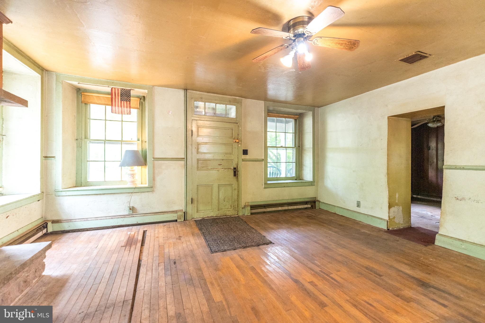 118 Geigel Hill Road Erwinna, PA 18920 - Photo 15 of 30 a view of an empty room with window and wooden floor