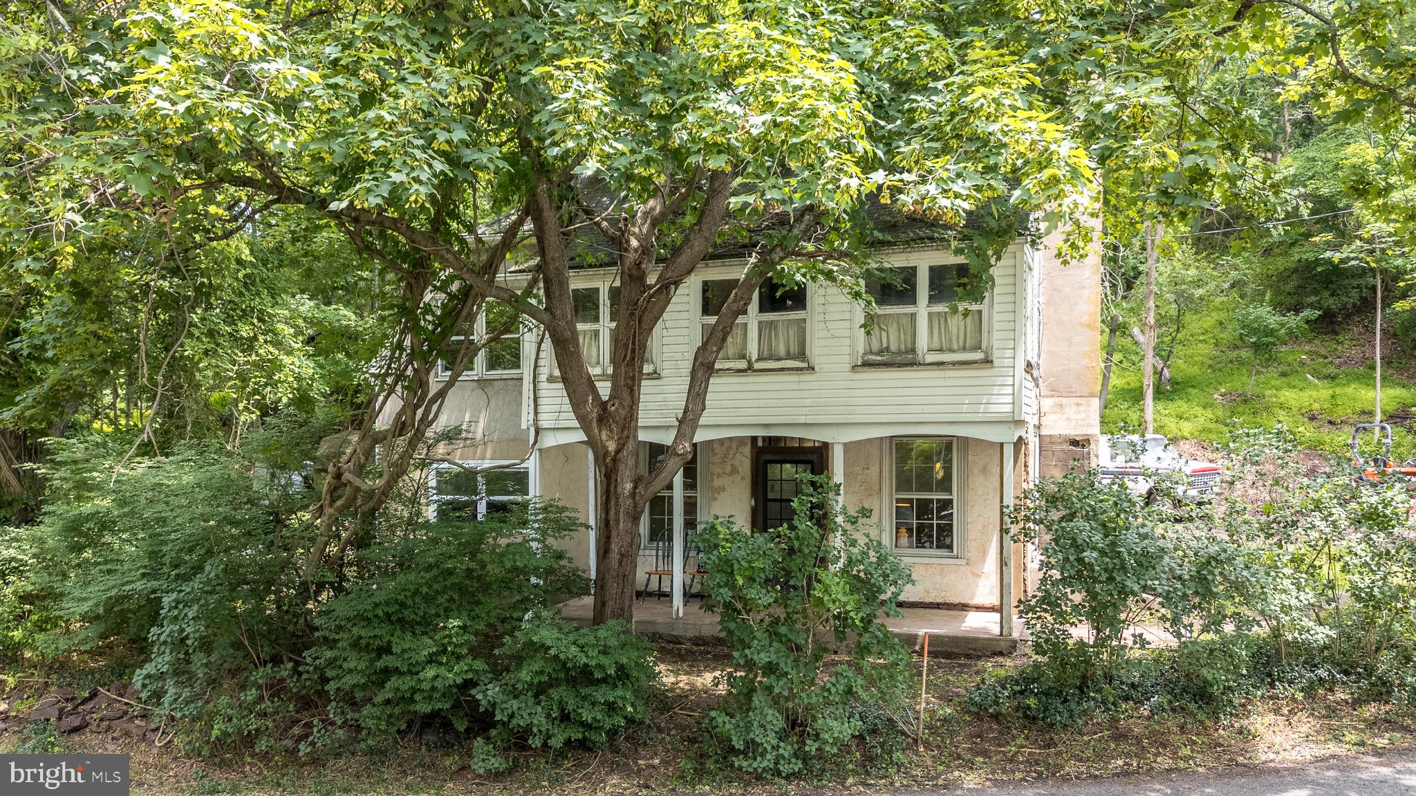118 Geigel Hill Road Erwinna, PA 18920 - Photo 2 of 30 a front view of a house with a tree