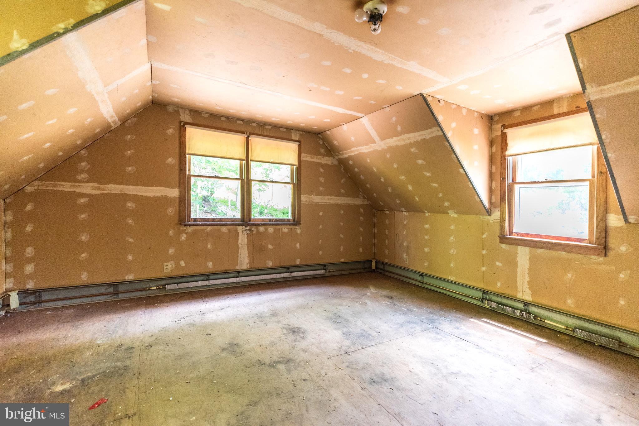118 Geigel Hill Road Erwinna, PA 18920 - Photo 21 of 30 an empty room with a empty space and windows