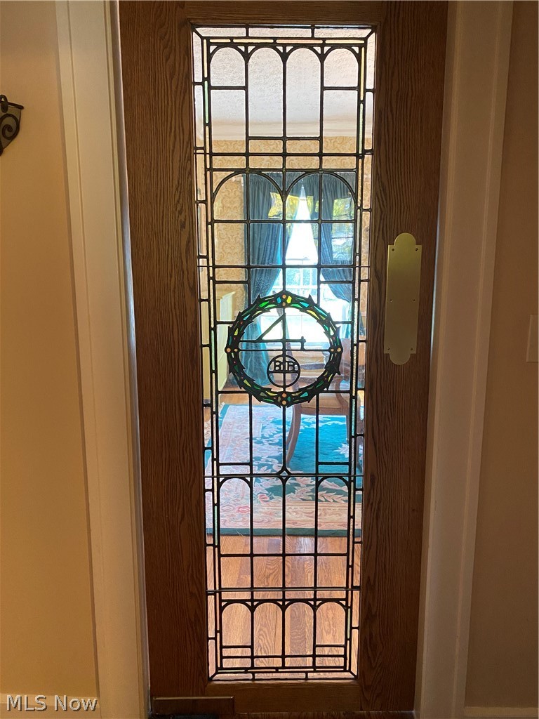 1387 Clearview Road Cleveland, OH 44124 - Photo 9 of 33 Additional leaded and stained glass detailing in this door which leads from the kitchen into the dining room. You don't find details like this in modern homes.