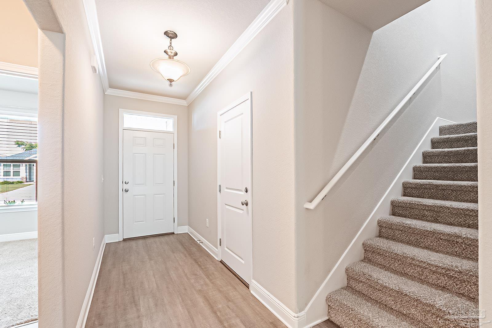 5398 Parkside Drive Pace, FL 32571 - Photo 13 of 36 a view of entryway with wooden floor