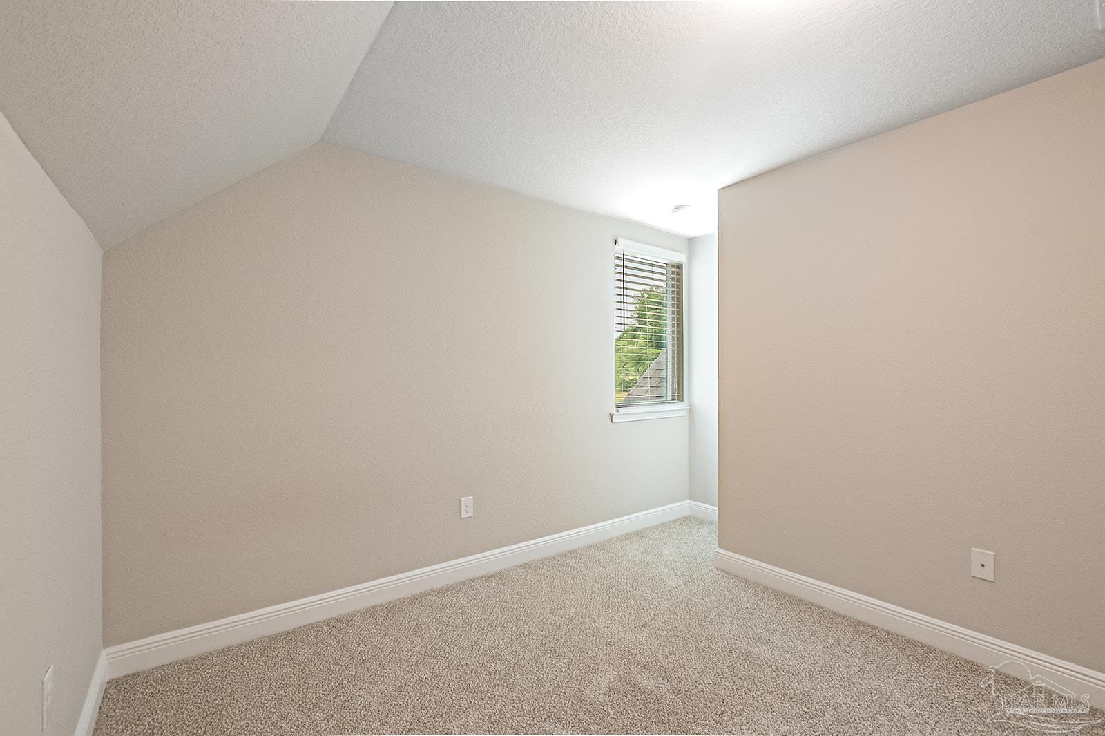 5398 Parkside Drive Pace, FL 32571 - Photo 17 of 36 an empty room with windows