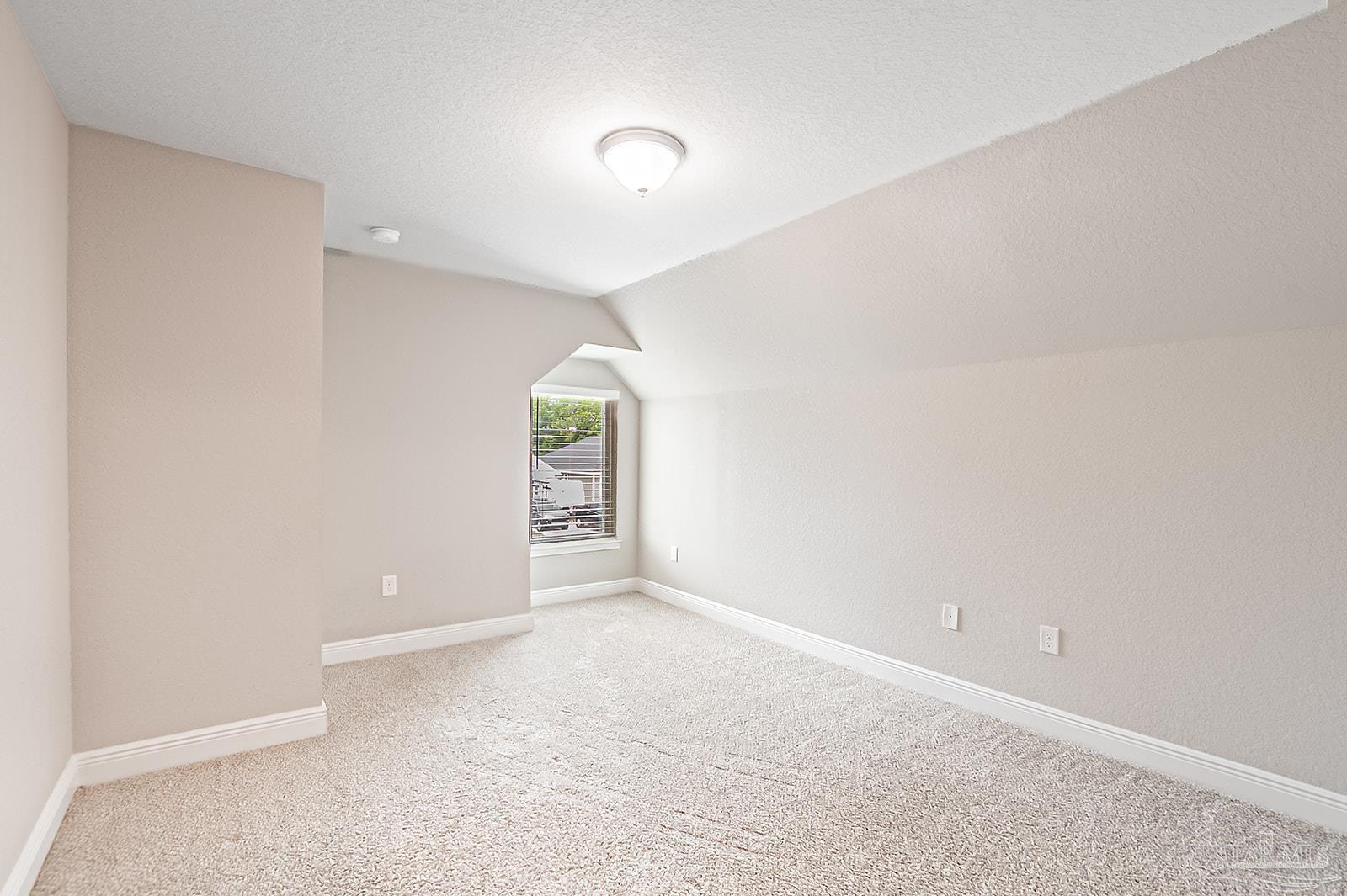 5398 Parkside Drive Pace, FL 32571 - Photo 21 of 36 an empty room with windows