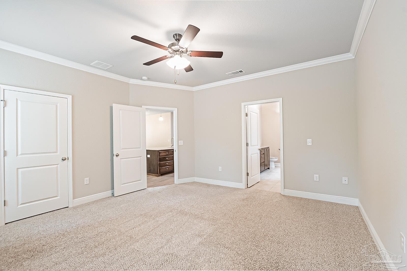 5398 Parkside Drive Pace, FL 32571 - Photo 31 of 36 an empty room with windows and fan