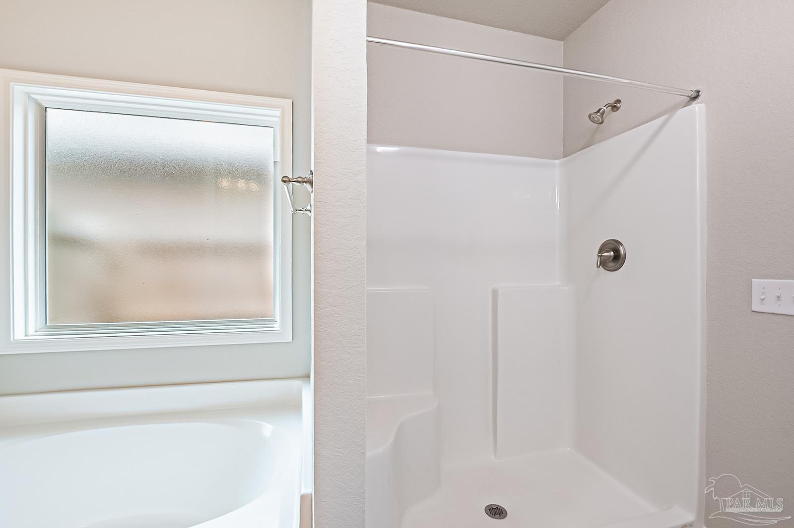 5398 Parkside Drive Pace, FL 32571 - Photo 35 of 36 a bathroom that has a glass shower door