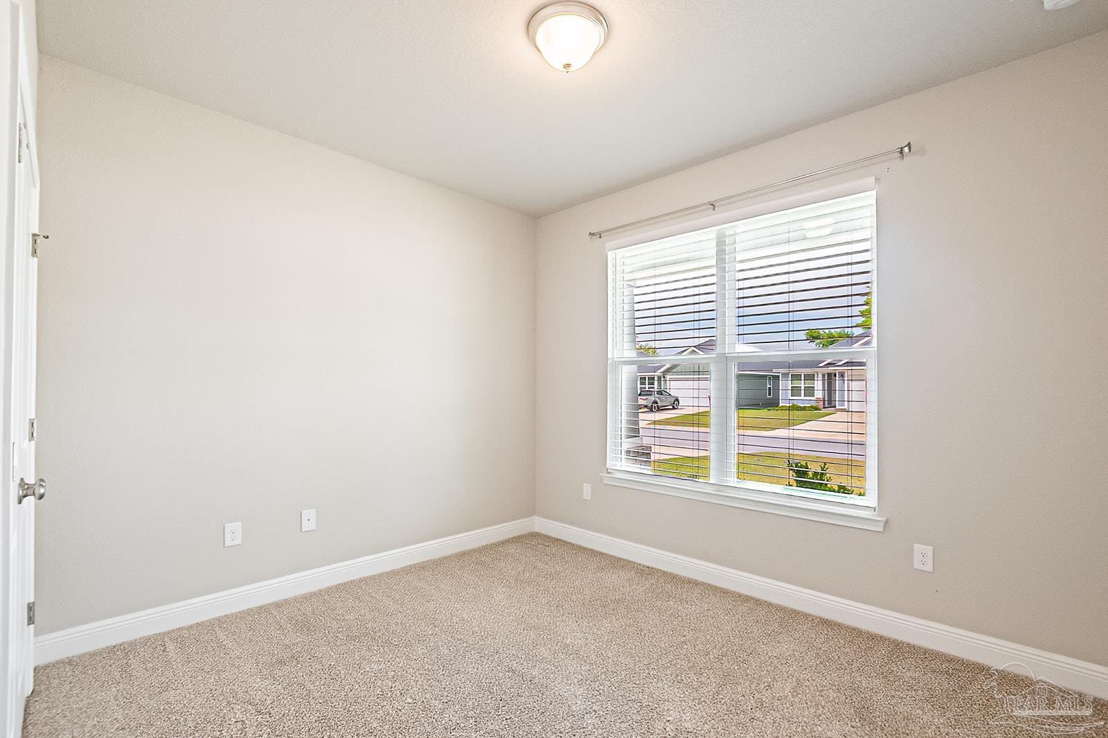 5398 Parkside Drive Pace, FL 32571 - Photo 7 of 36 an empty room with a window