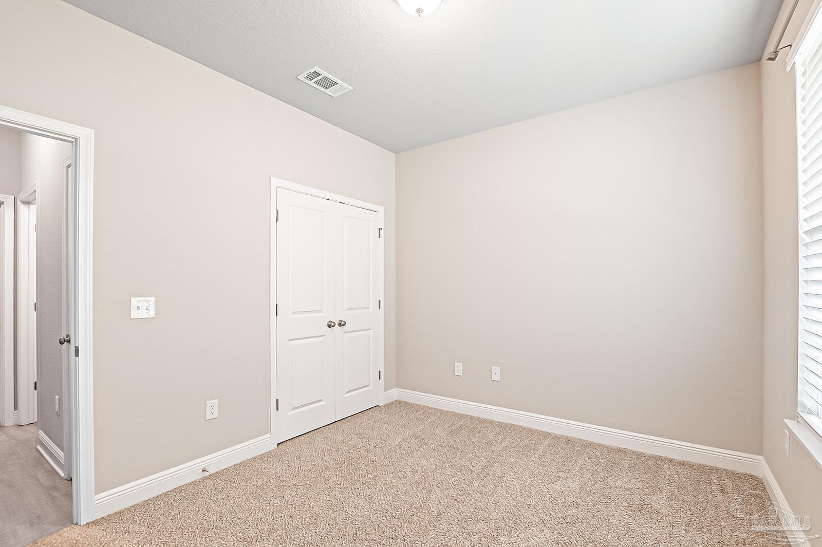 5398 Parkside Drive Pace, FL 32571 - Photo 8 of 36 a view of an empty room