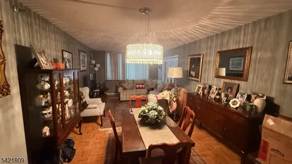 a view of a living room and dining room