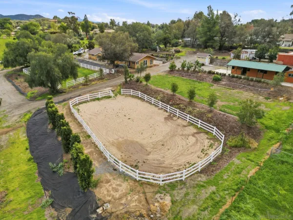 a view of a swimming pool with a yard