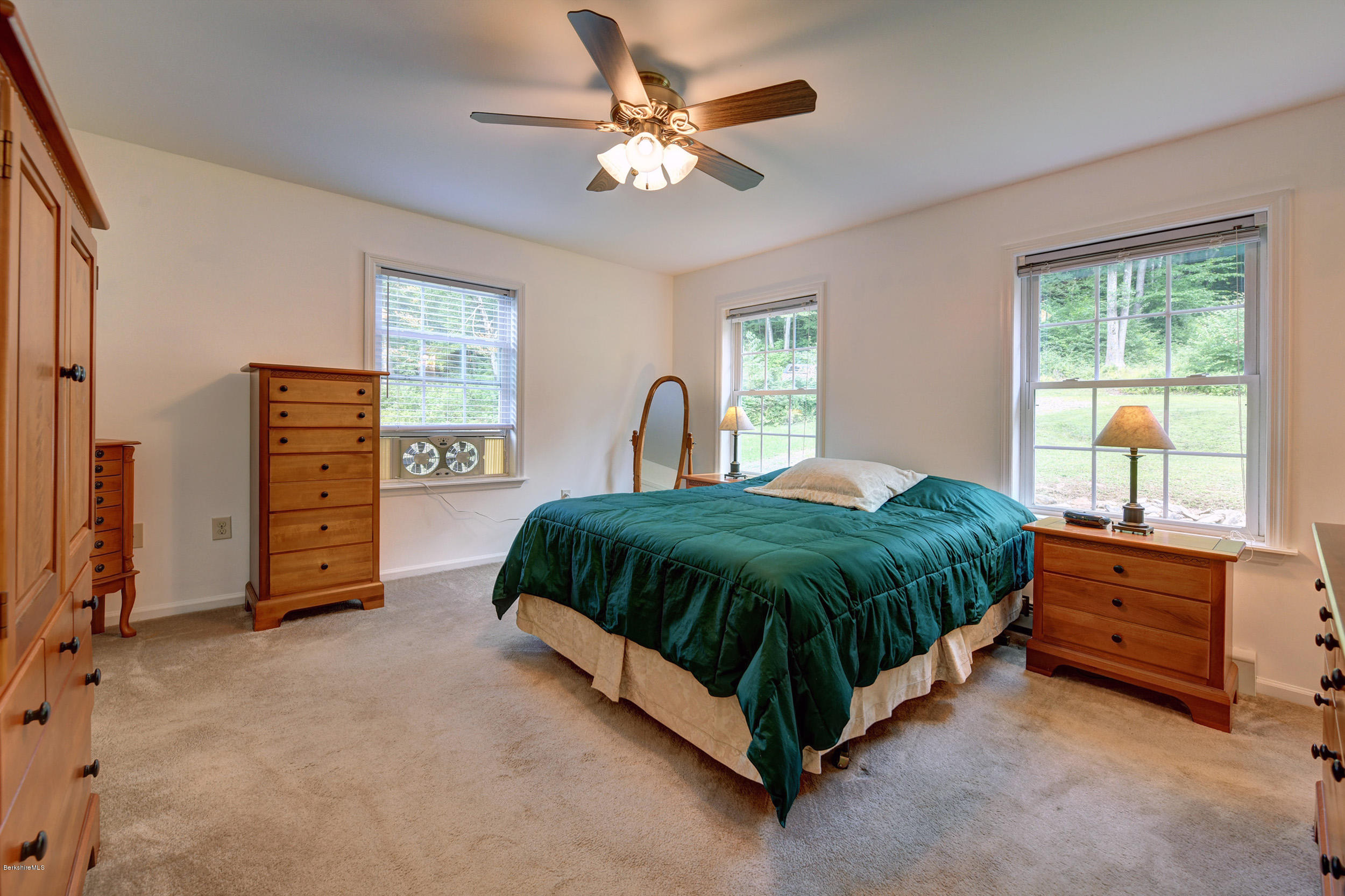 15 Lake View Road Peru, MA 01235 - Photo 14 of 39 a spacious bedroom with a bed and a dresser