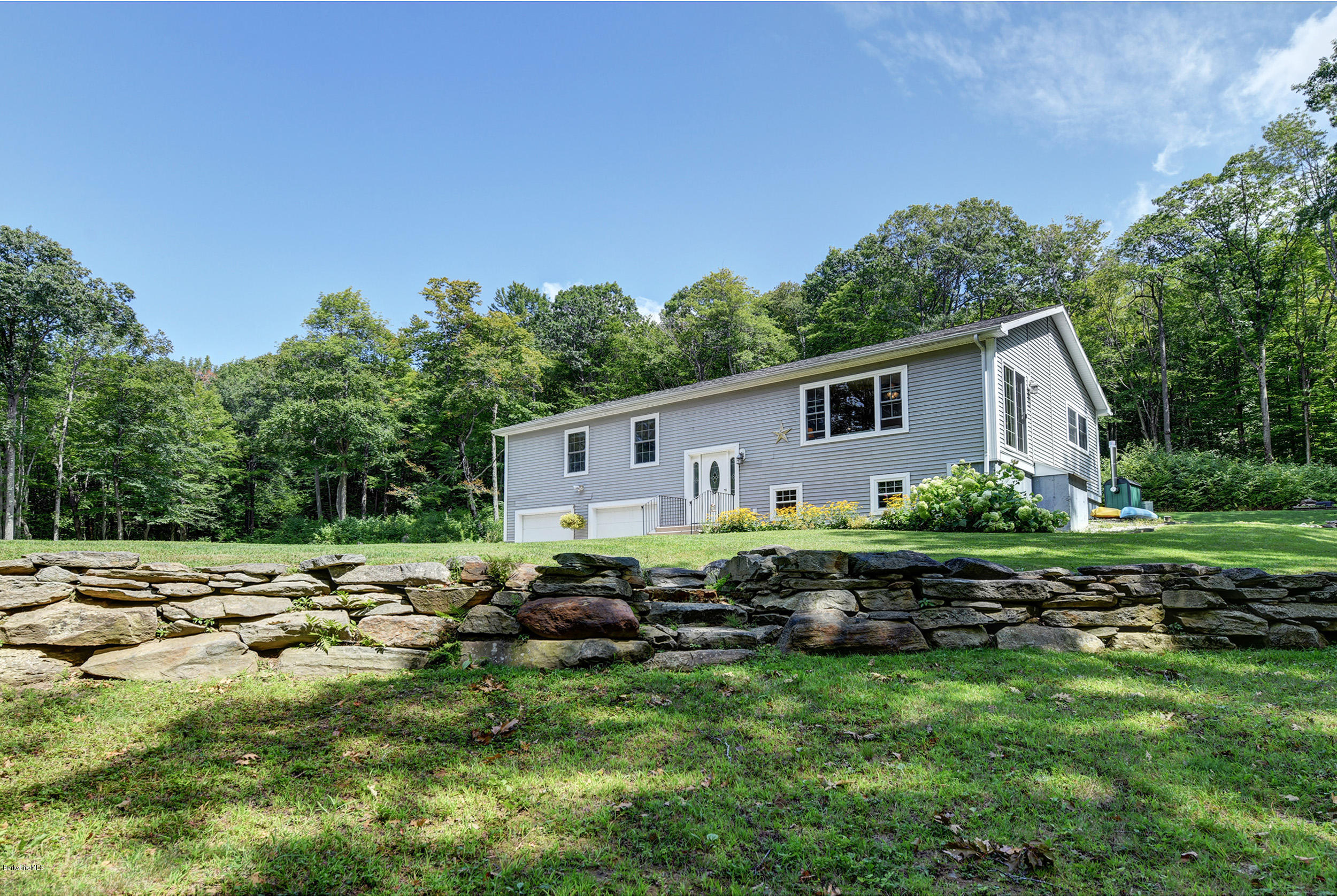 15 Lake View Road Peru, MA 01235 - Photo 3 of 39 a backyard of a house with lots of green space