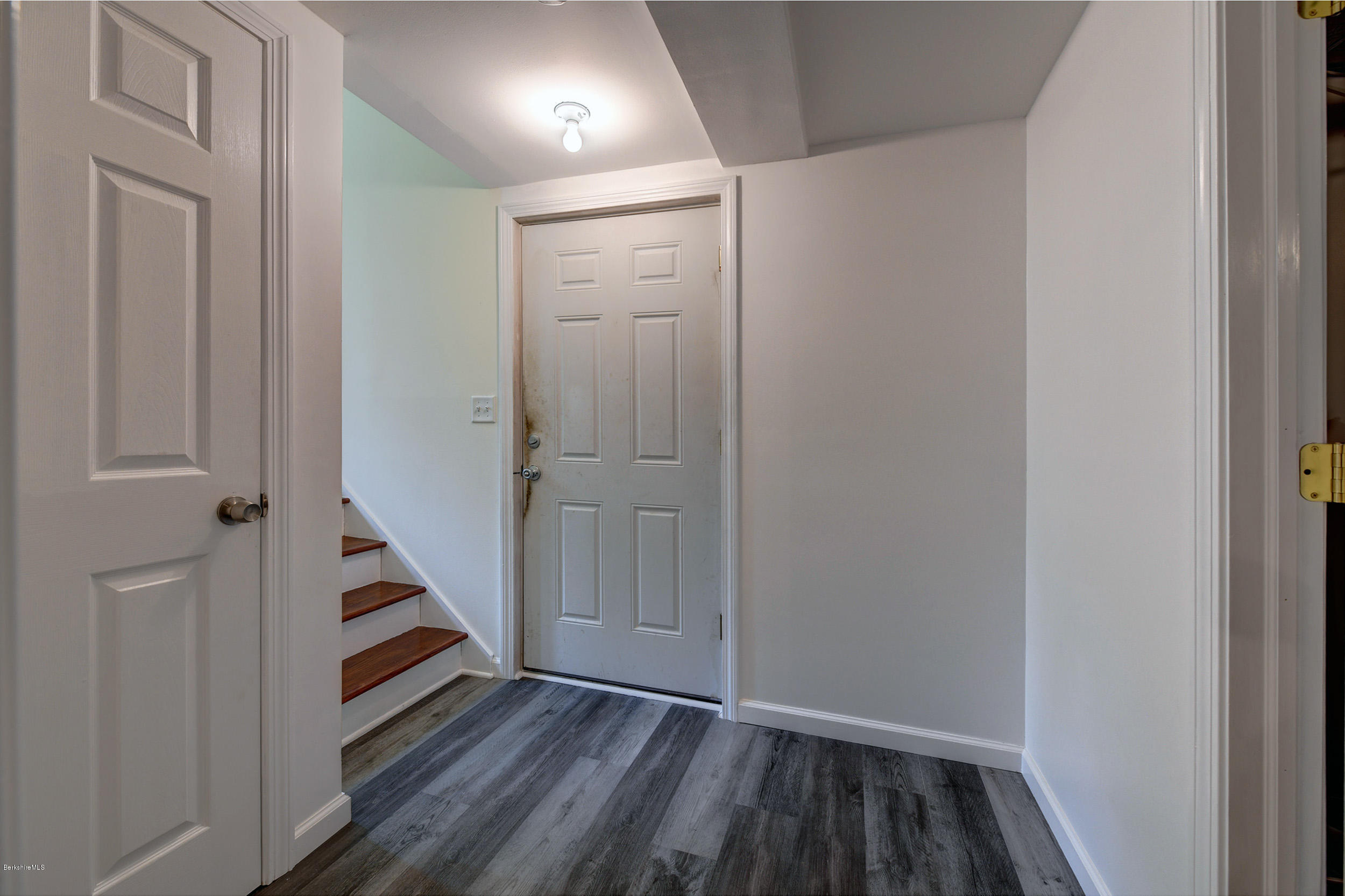 15 Lake View Road Peru, MA 01235 - Photo 22 of 39 a view of a hallway with wooden floor and entryway