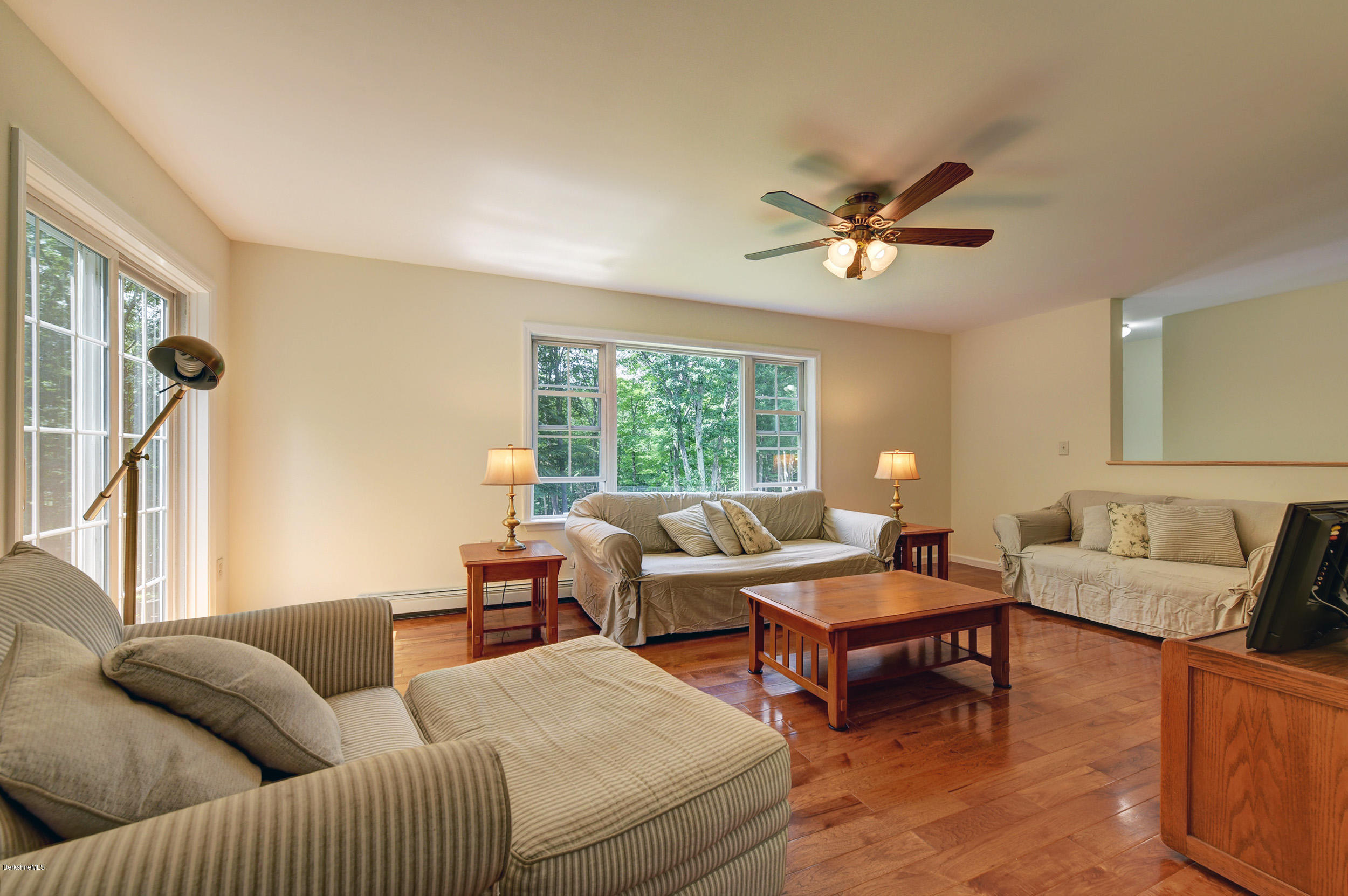 15 Lake View Road Peru, MA 01235 - Photo 6 of 39 a living room with furniture and a large window