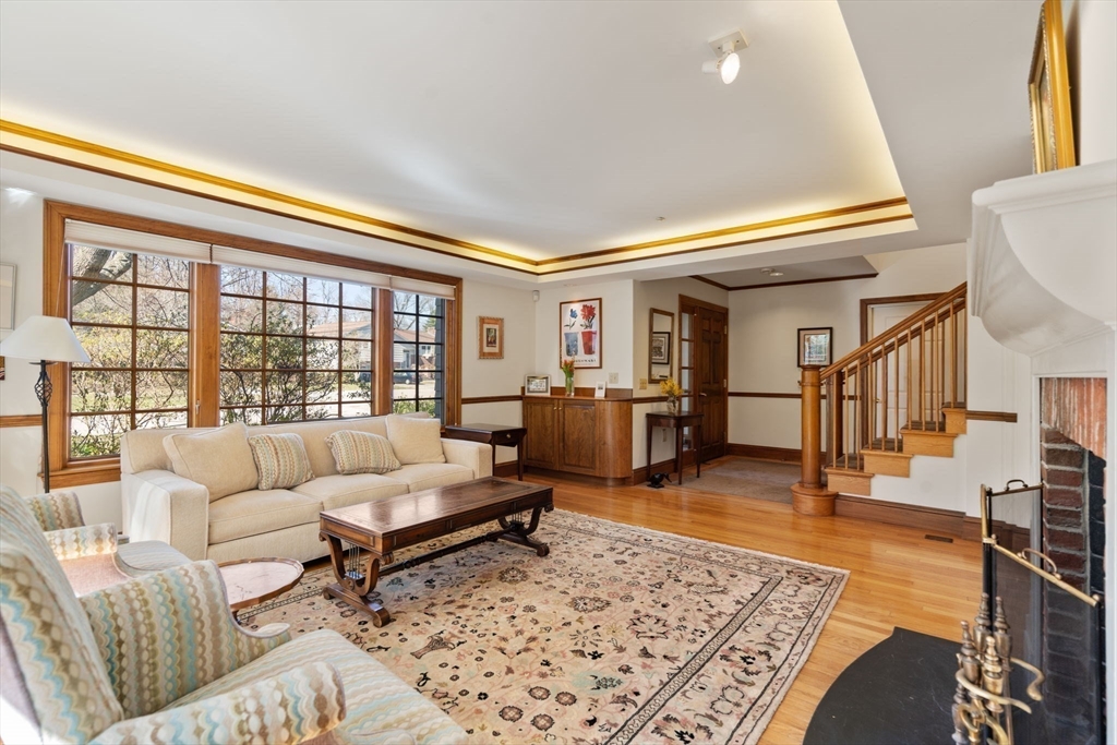 530 Clinton Road Brookline, MA 02467 - Photo 4 of 25 a living room with furniture rug and a table