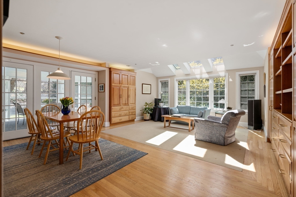 530 Clinton Road Brookline, MA 02467 - Photo 8 of 25 a living room with furniture and a large window