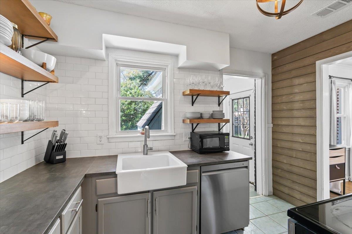 4638 Monaco Road Memphis, TN 38117 - Photo 15 of 28 a kitchen with a sink and a stove top oven