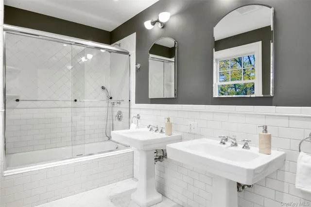 a bedroom with a bed chair and a window