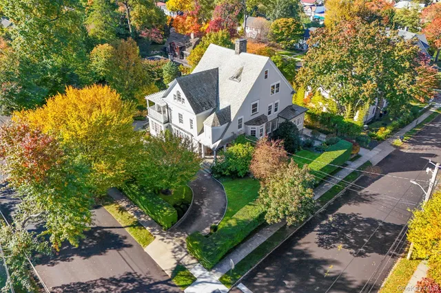 an aerial view of a house with a garden