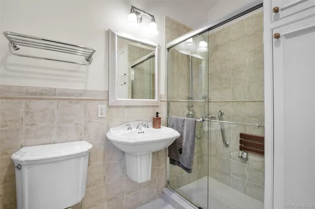 an aerial view of residential houses with outdoor space and street view