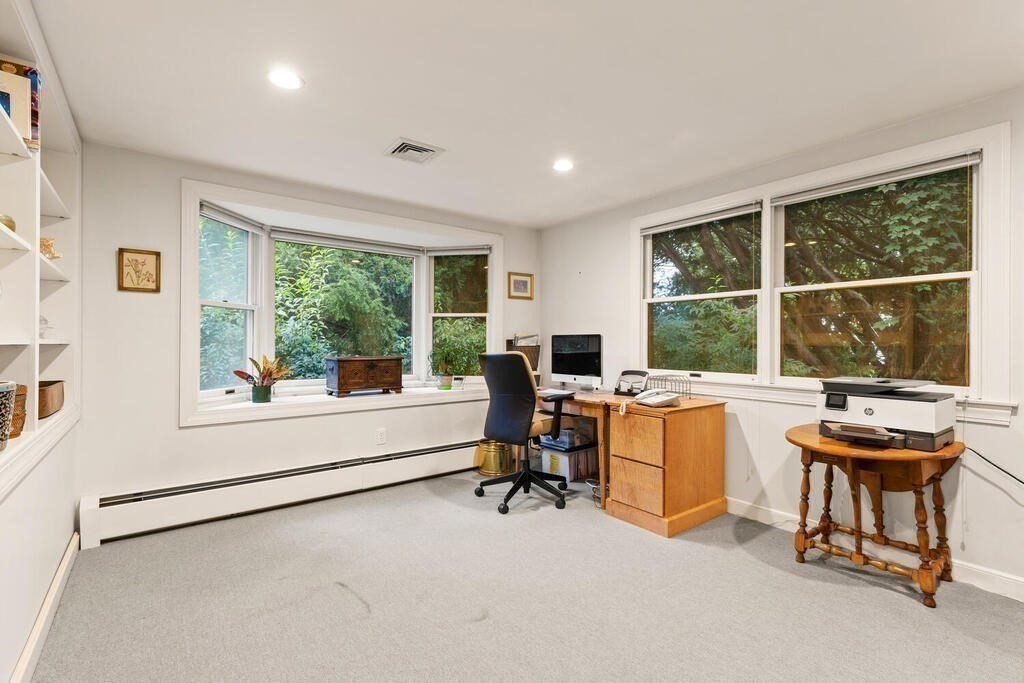 82 Cary Avenue Lexington, MA 02421 - Photo 17 of 29 a view of a workspace with furniture and a window