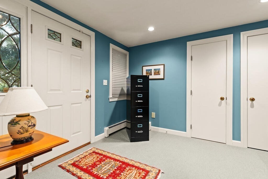 82 Cary Avenue Lexington, MA 02421 - Photo 18 of 29 a room with furniture and closet
