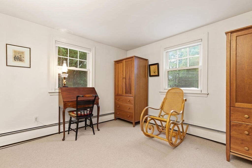 82 Cary Avenue Lexington, MA 02421 - Photo 24 of 29 a view of a workspace with furniture and a window
