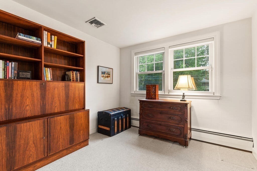 82 Cary Avenue Lexington, MA 02421 - Photo 25 of 29 a bed room with a bed and a window
