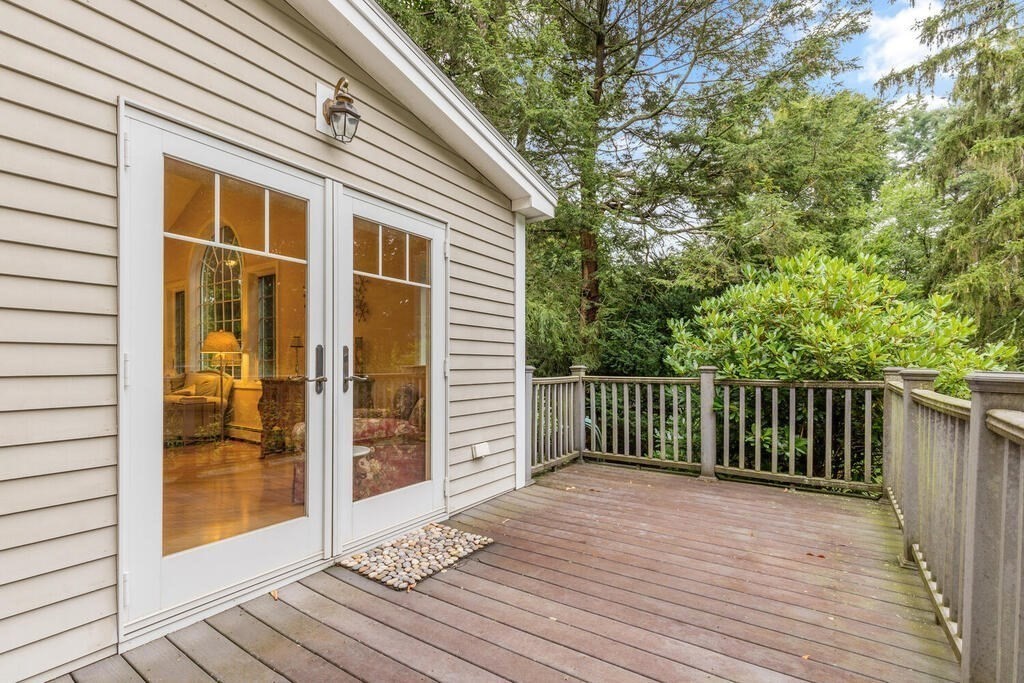 82 Cary Avenue Lexington, MA 02421 - Photo 26 of 29 a view of backyard with a deck and wooden floor