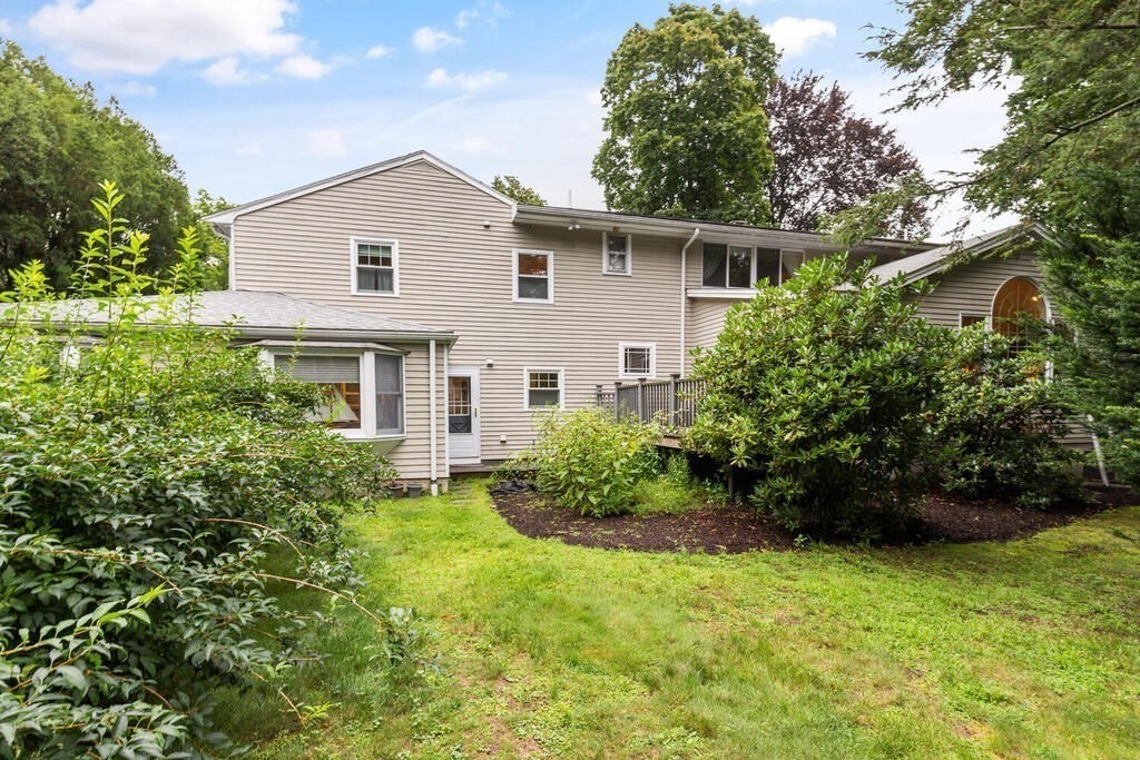 82 Cary Avenue Lexington, MA 02421 - Photo 27 of 29 a view of a house with backyard and garden