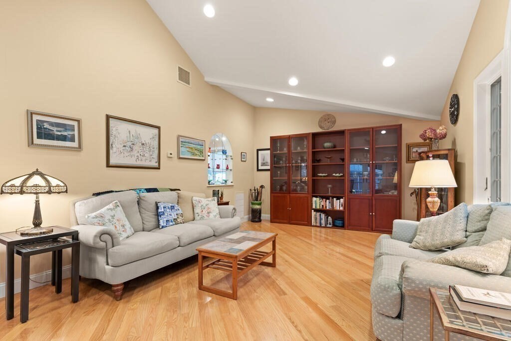 82 Cary Avenue Lexington, MA 02421 - Photo 8 of 29 a living room with furniture and wooden floor