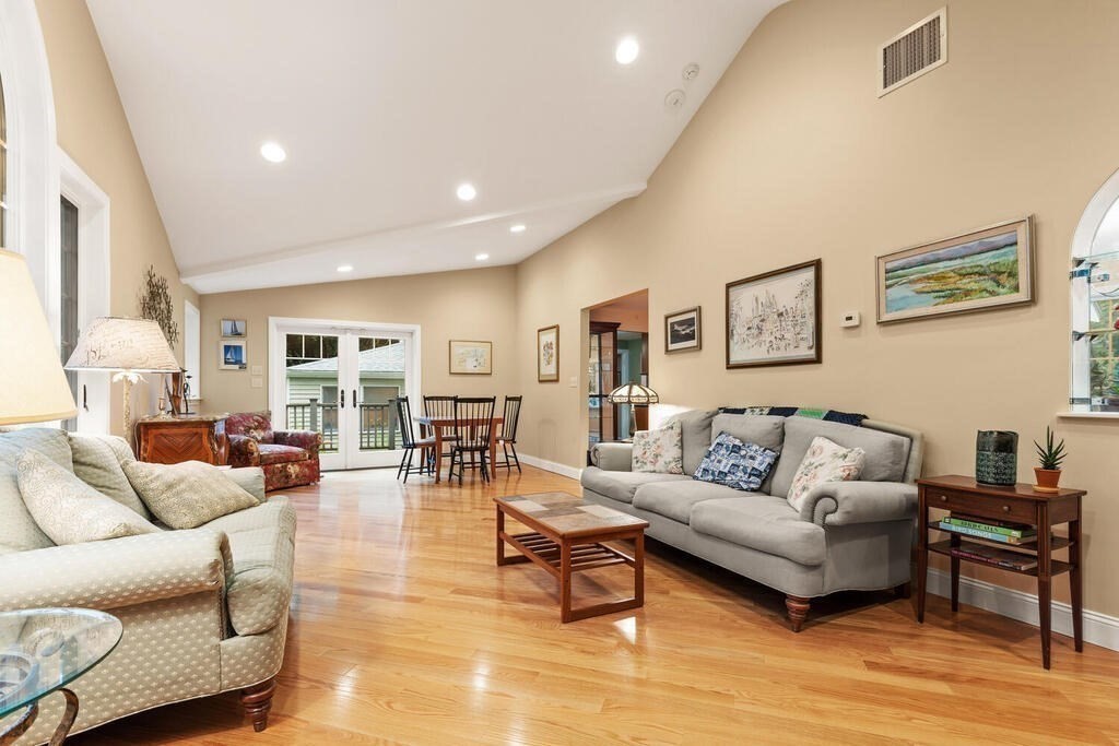 82 Cary Avenue Lexington, MA 02421 - Photo 9 of 29 a living room with furniture and a wooden floor