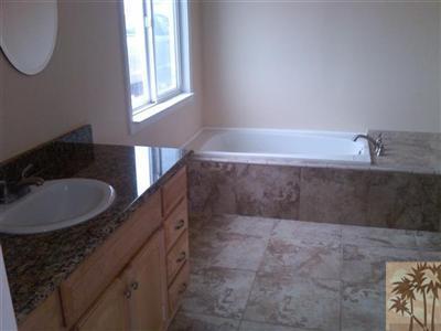 59498 Everett Road Anza, CA 92539 - Photo 11 of 22 a bathroom with a bathtub and a sink