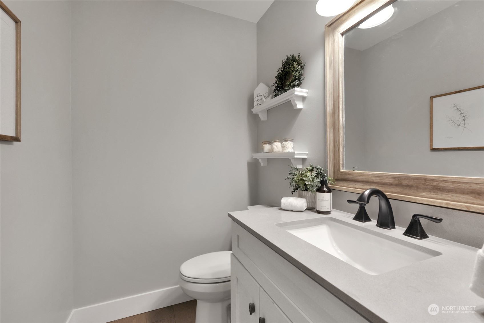 25323 Cromwell Road Monroe, WA 98272 - Photo 16 of 38 a bathroom with a granite countertop toilet sink and mirror